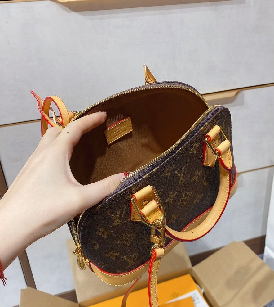 Alma LV monogram bag 