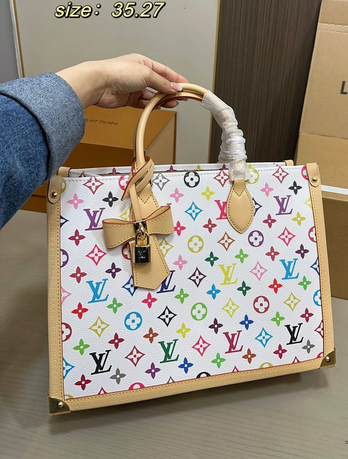 LV x TM Borsa OnTheGo MM Autres Toiles Monogram