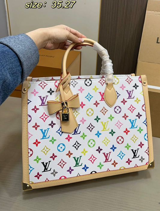 LV x TM Borsa OnTheGo MM Autres Toiles Monogram